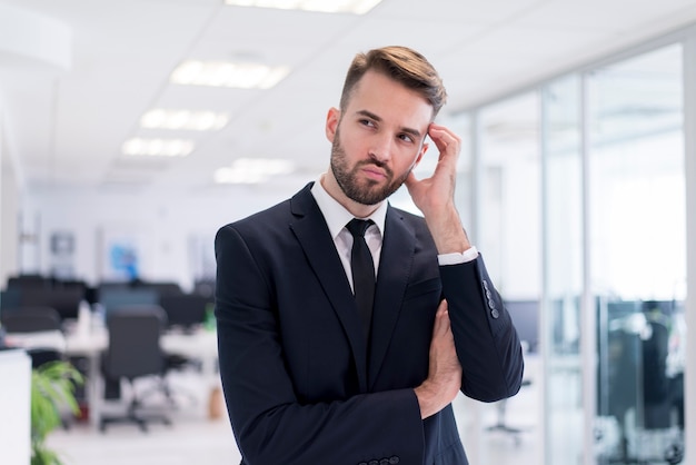 Man scratching his head