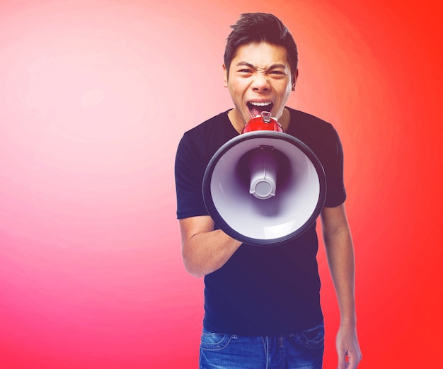 Man screaming at a megaphone