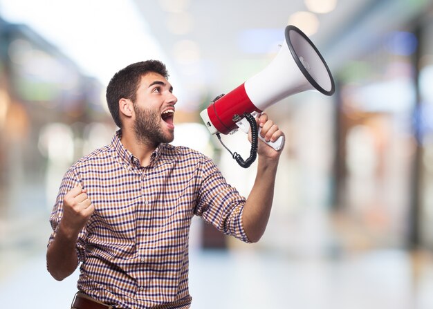 Man screaming in the megaphone