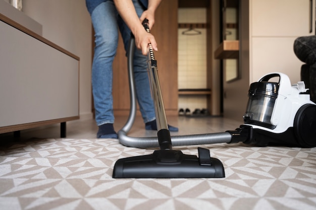 Man servant doing chores around the house