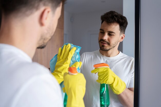 Man servant doing chores around the house