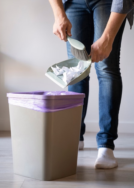 Man servant doing chores around the house