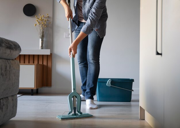 Man servant doing chores around the house