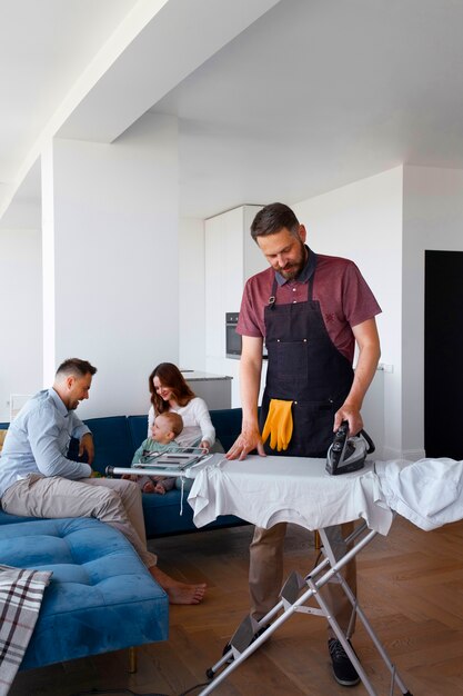 Man servant ironing clothing