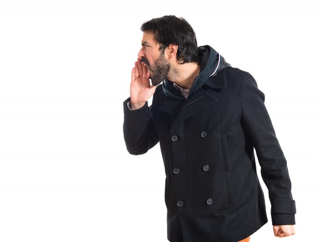 Man shouting over white background