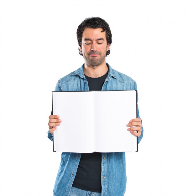 Man showing book over white background