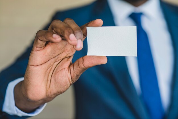 Man showing business card