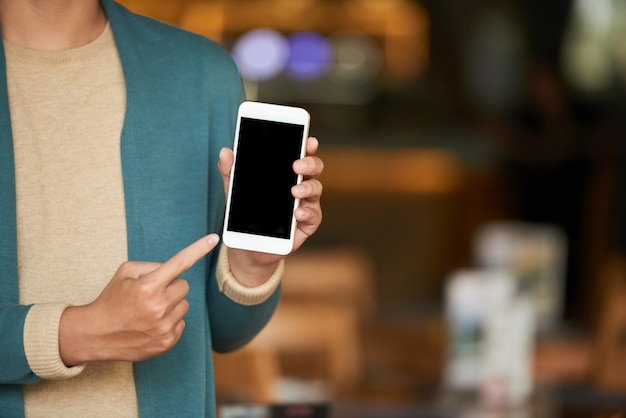 Man showing smartphone