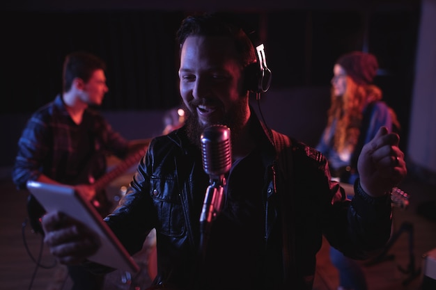 Man singing on retro microphone