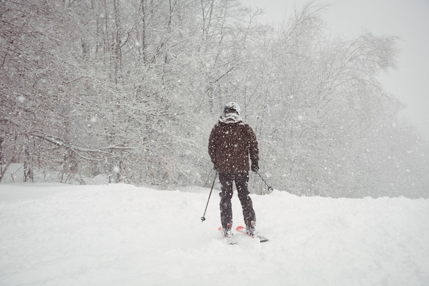 Man skiing down the mountain