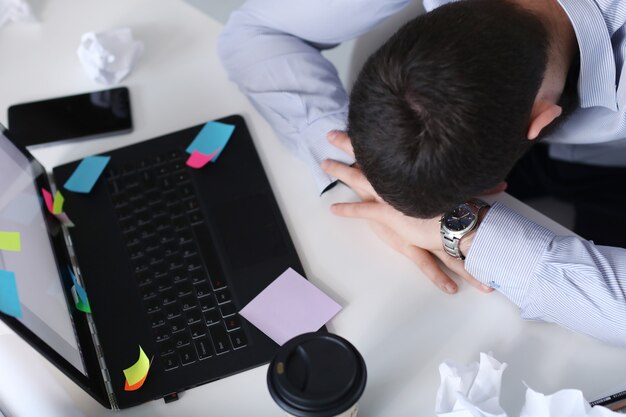 Man sleeping at work