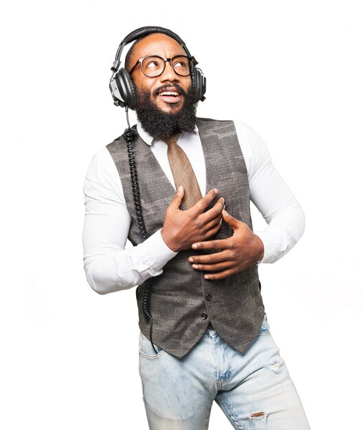 Man smiling listening to music with headphones