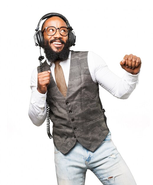 Man smiling listening to music with headphones