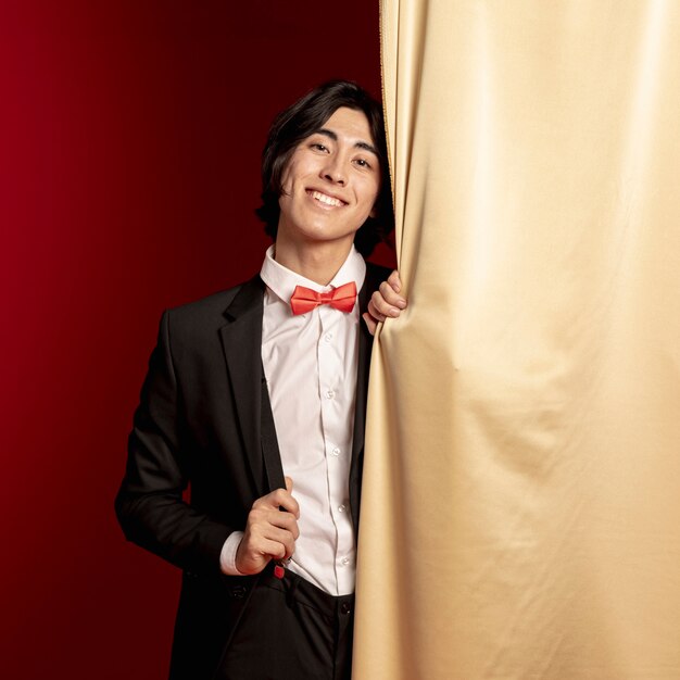 Man smiling in suit for chinese new year