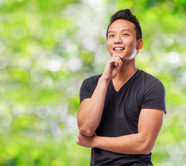 Man smiling thoughtfully