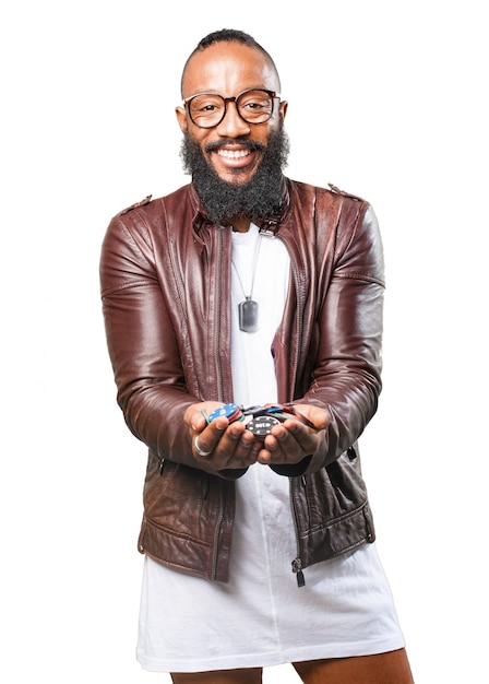 Man smiling with casino chips in hands