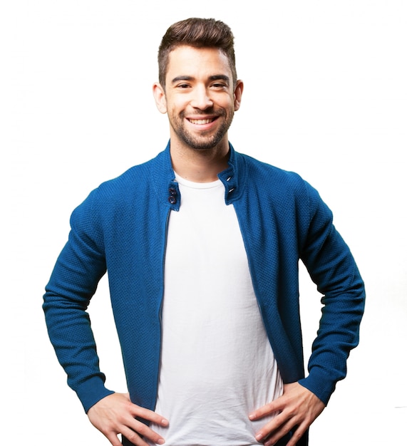 Man smiling with hands on hips