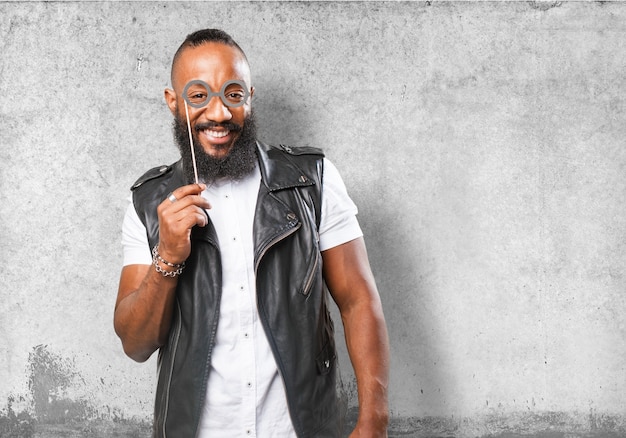 Man smiling with joking glasses