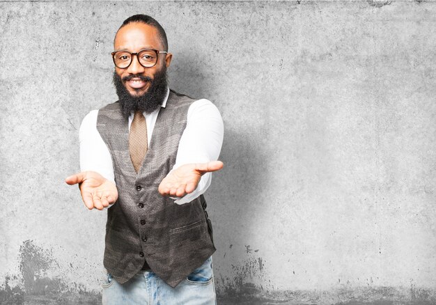 Man smiling with outstretched hands