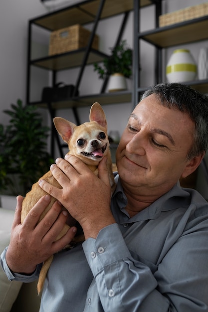 Man spending time with dog at home