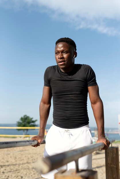 Man in sportswear outdoors exercising