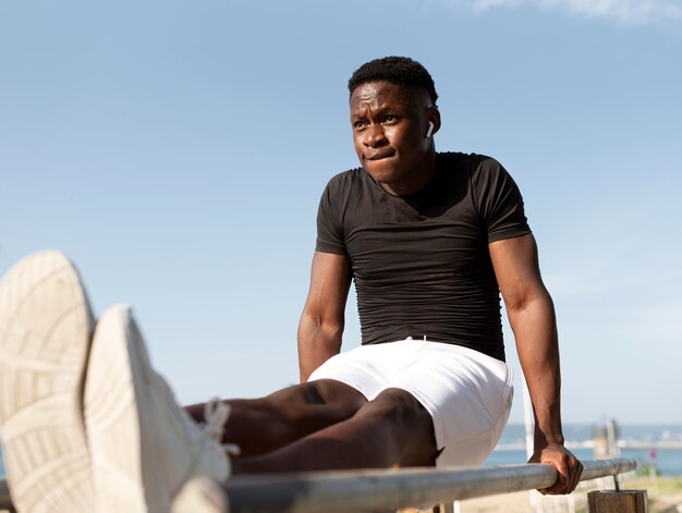 Man in sportswear outdoors exercising