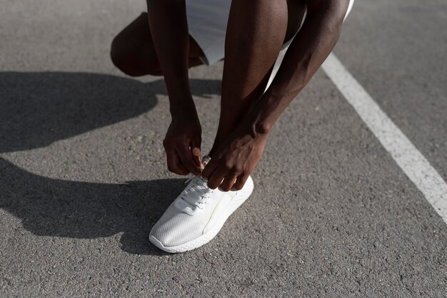 Man in sportswear outdoors exercising