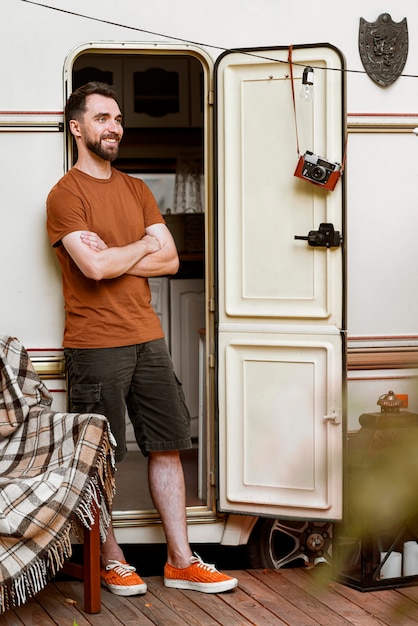 Man standing in front of van