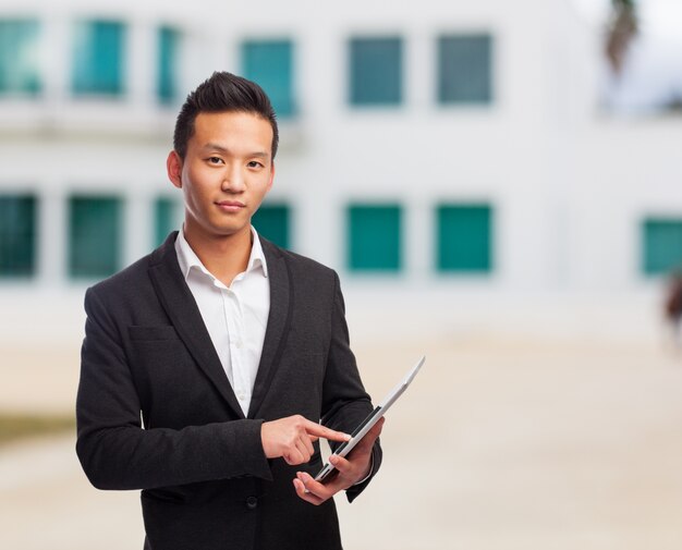 Man in the street with a tablet