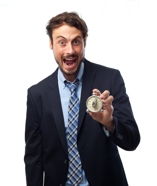 Man in suit and open mouth with a timer in his hand