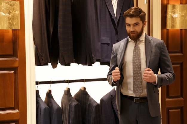 Man in suit posing  shop