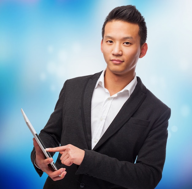 Man in suit with a blue background