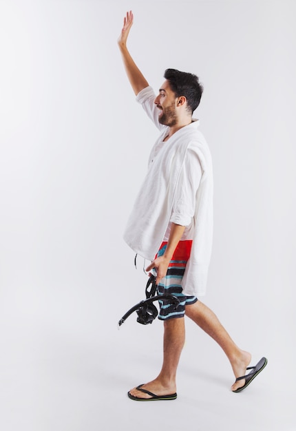 Man in summer wear raising hand