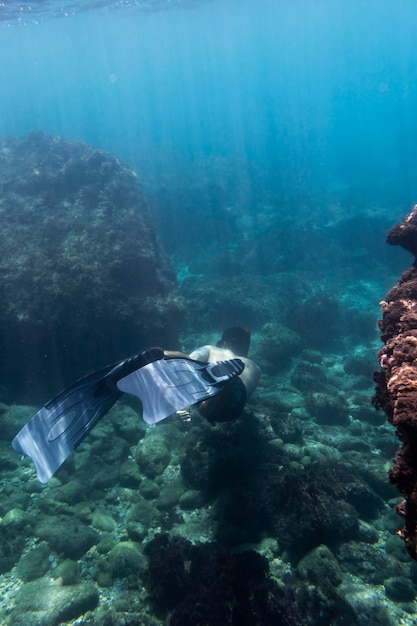 Man swimming under water