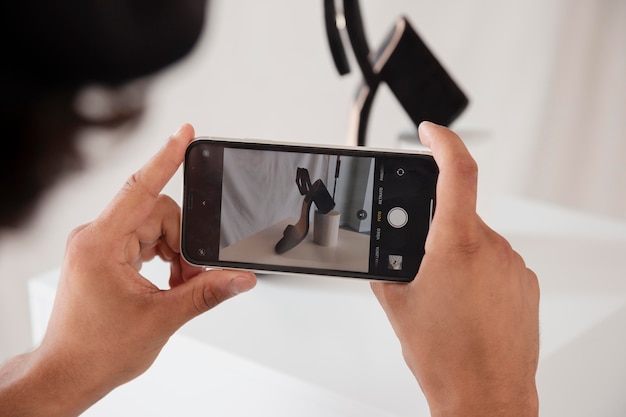 Man taking a photo in his studio