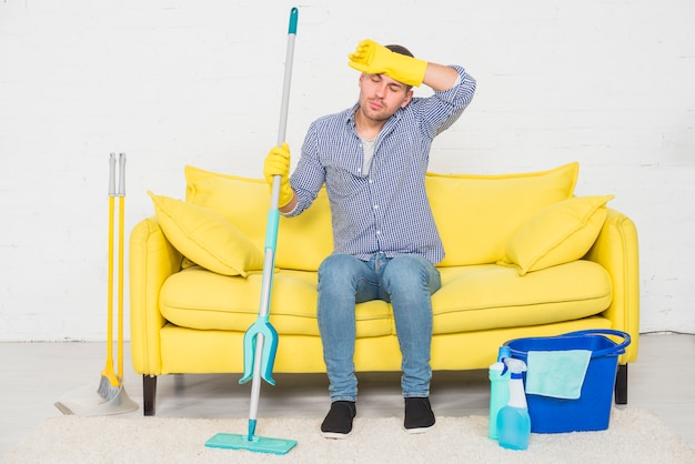 Man taking a rest after cleaning