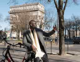 Free photo man taking selfie in the city in france