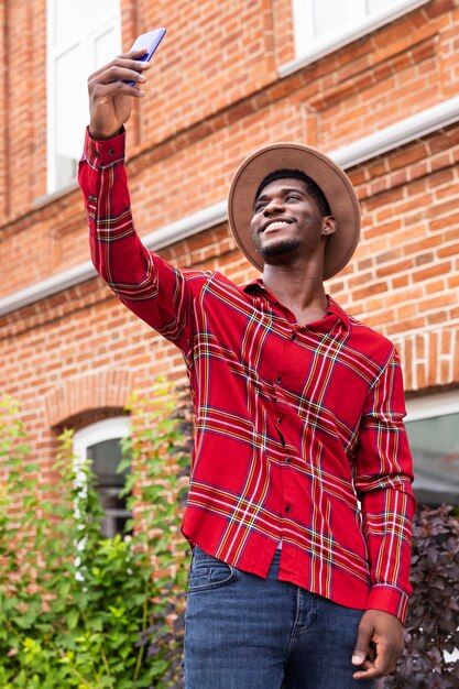 Man taking a selfie while standing