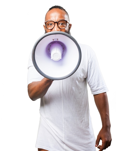 Free photo man talking on a megaphone