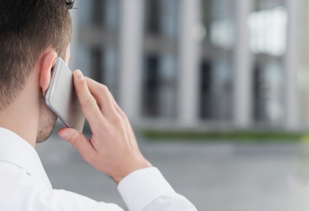 Man talking on the phone close up