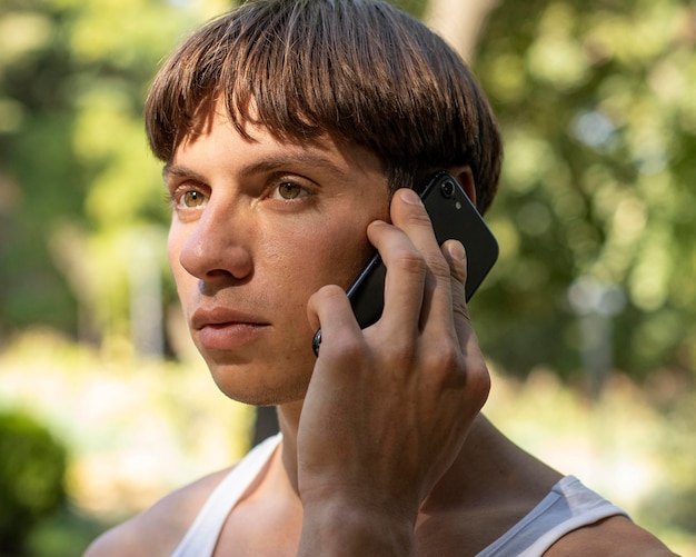 Man talking on the phone outdoors