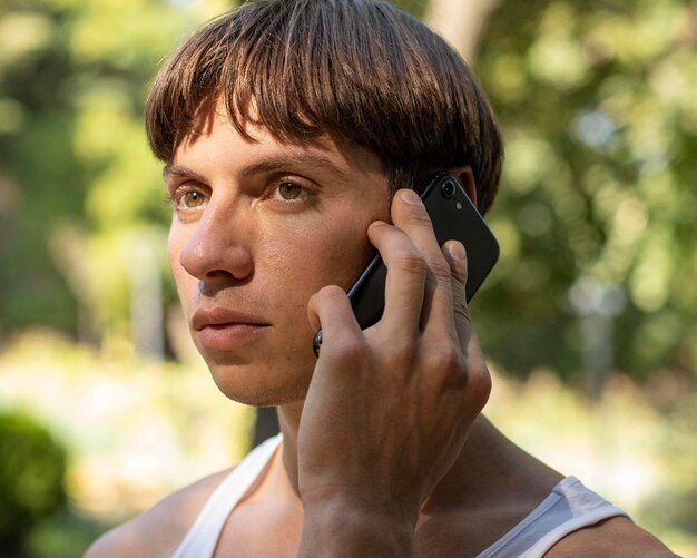 Man talking on the phone outdoors