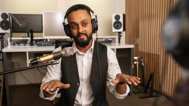 Man talking at a radio station