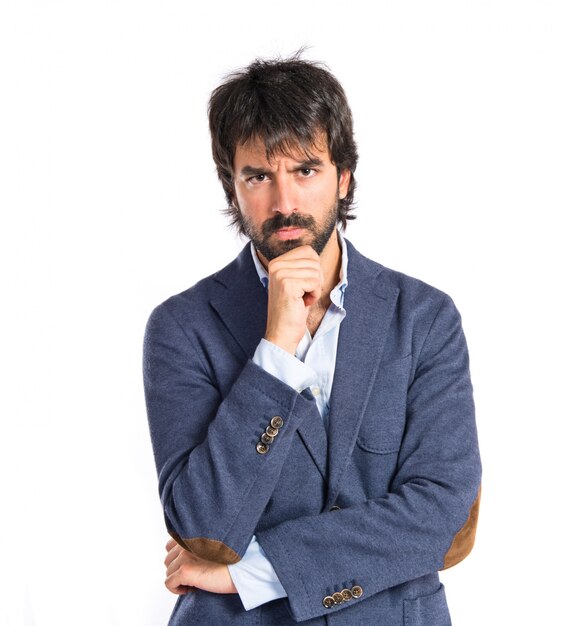 Man thinking over isolated white background