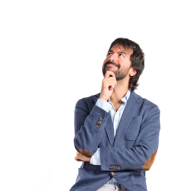 Man thinking over isolated white background