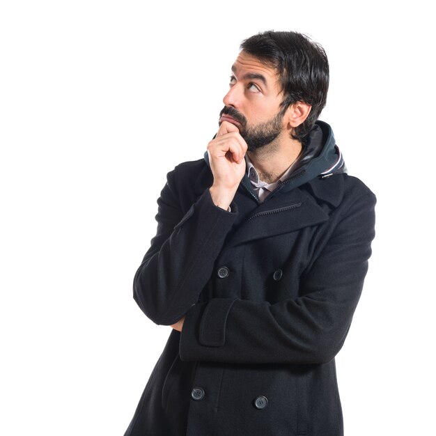 Man thinking over white background