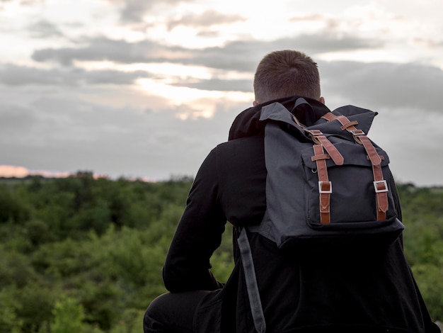 Man on top of mountain