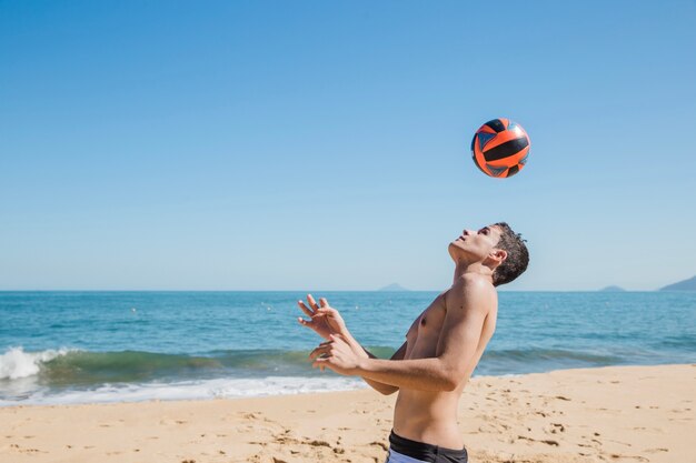 Man touching the ball with the head