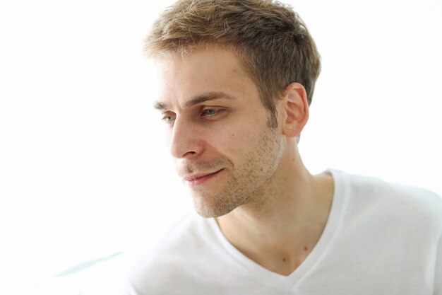 Man touching his beard, ready for shaving.