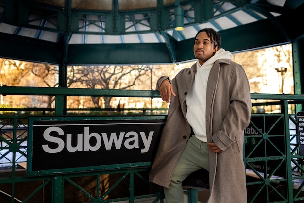 Free photo man traveling with the city subway